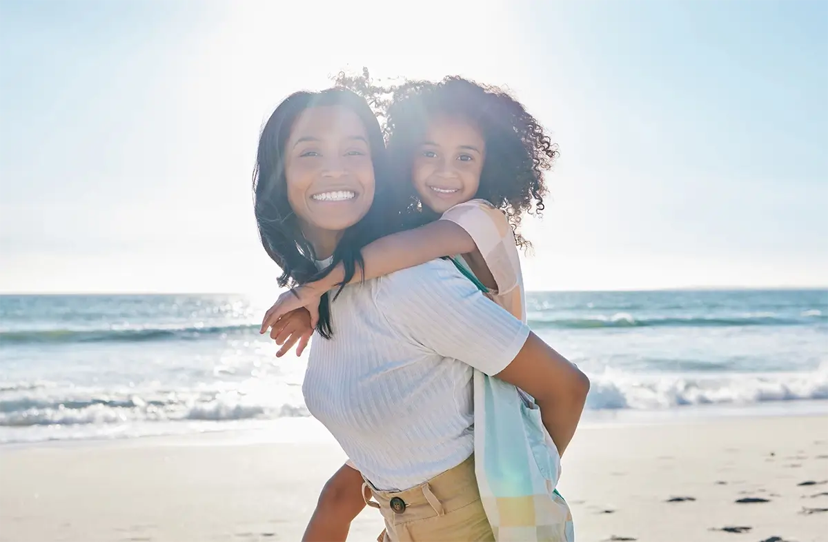 woman-and-child-on-beach copy